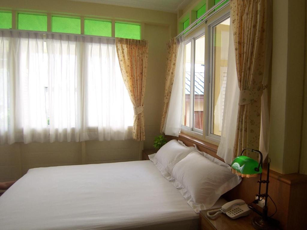 A Pousada Baan Dinso Banguecoque Quarto foto